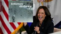 Kamala Harris holding sign