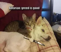 Cat with knife at dog's throat