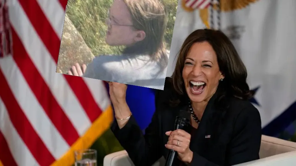 Kamala Harris holding sign