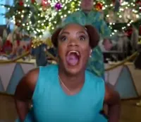 bald black woman in white house christmas video