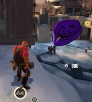 Engineer watches Pyro fight Troll Face