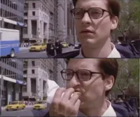 Peter parker eating a hot dog