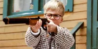 Ralphie from Christmas Story with gun