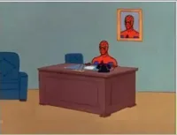 Spider man at his desk