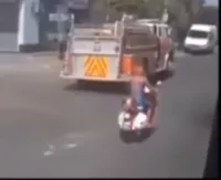 spider man on a scooter