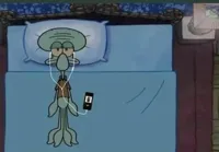 SpongeBob Squidward listening to music in bed